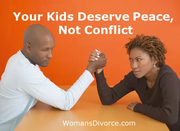 man and woman arm wrestling