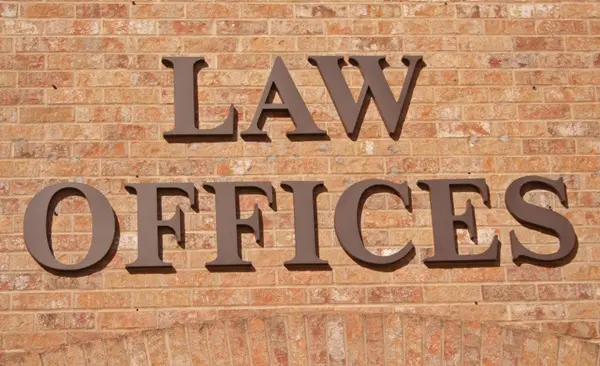 Law offices sign on side of building