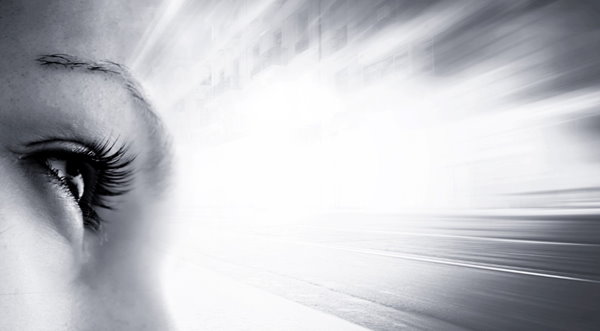 Closeup up of woman's eye looking forward as she begins getting back into life after divorce Closeup up of woman's eye looking forward as she begins getting back into life after divorce