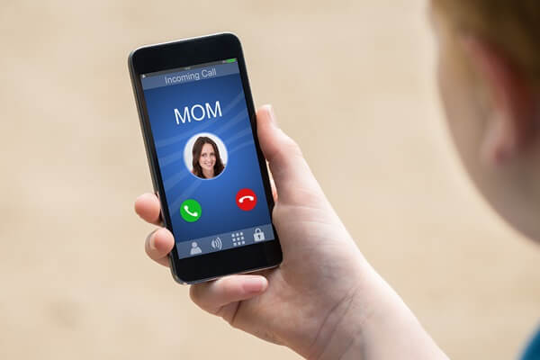 Mom calling on cell phone. Will the call be answered? Mom calling on cell phone. Will the call be answered?