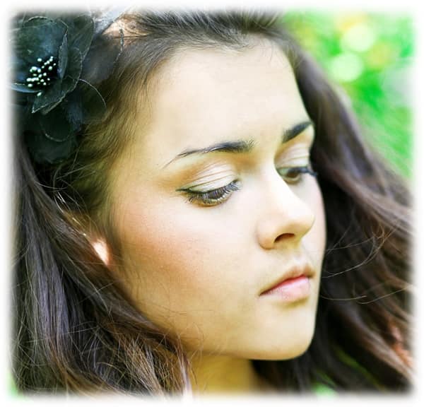 Teen girl gazing down contemplating problems Teen girl gazing down contemplating problems